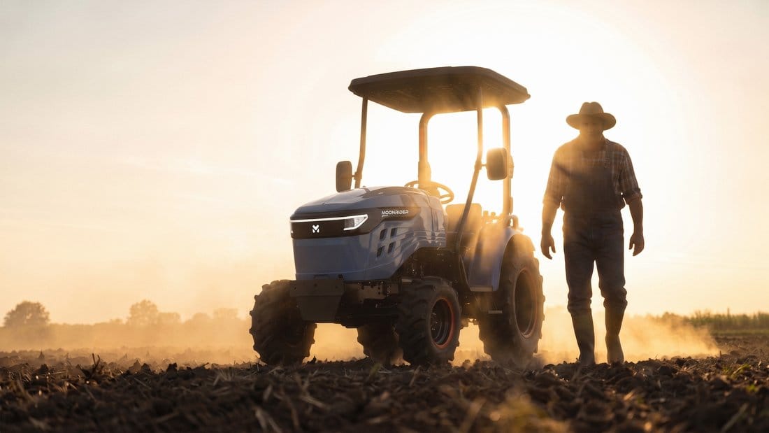 A farmer and the Moonrider at golden hour